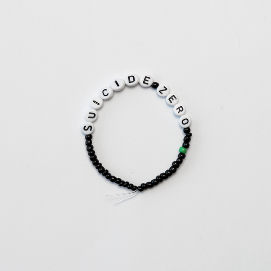 Armband - Svart med en grön pärla