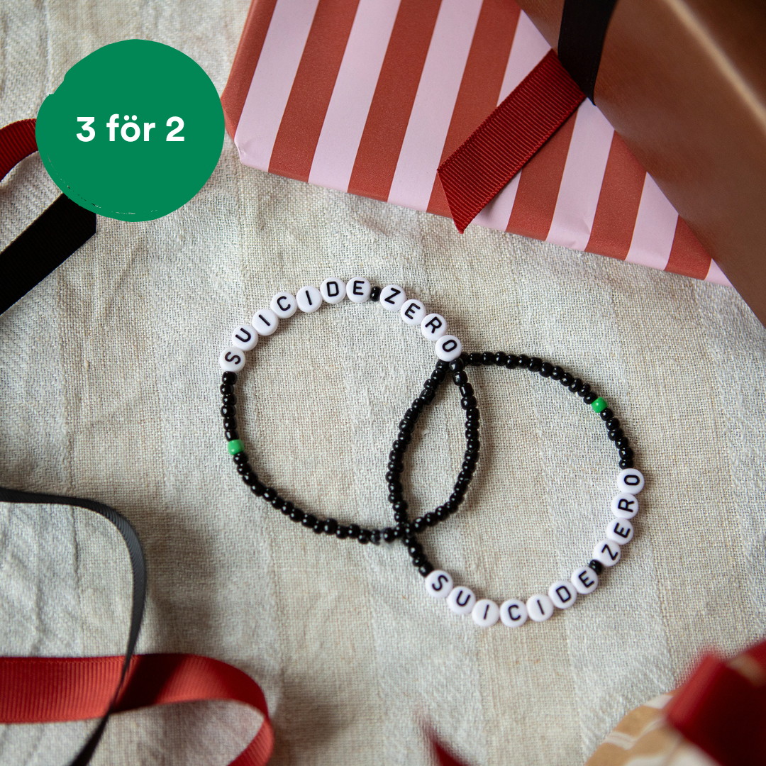 Armband - Svart med en grön pärla - 3 för 2